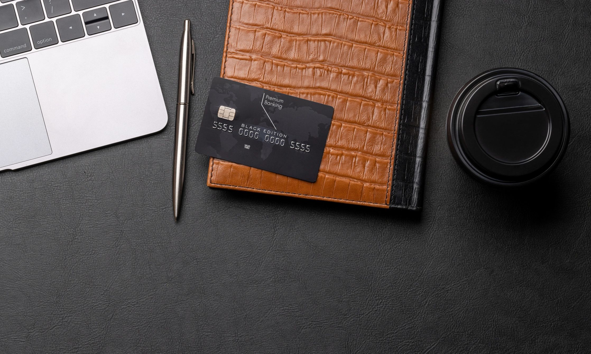 Black credit card on office table